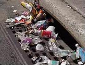Storm drain blocked by trash